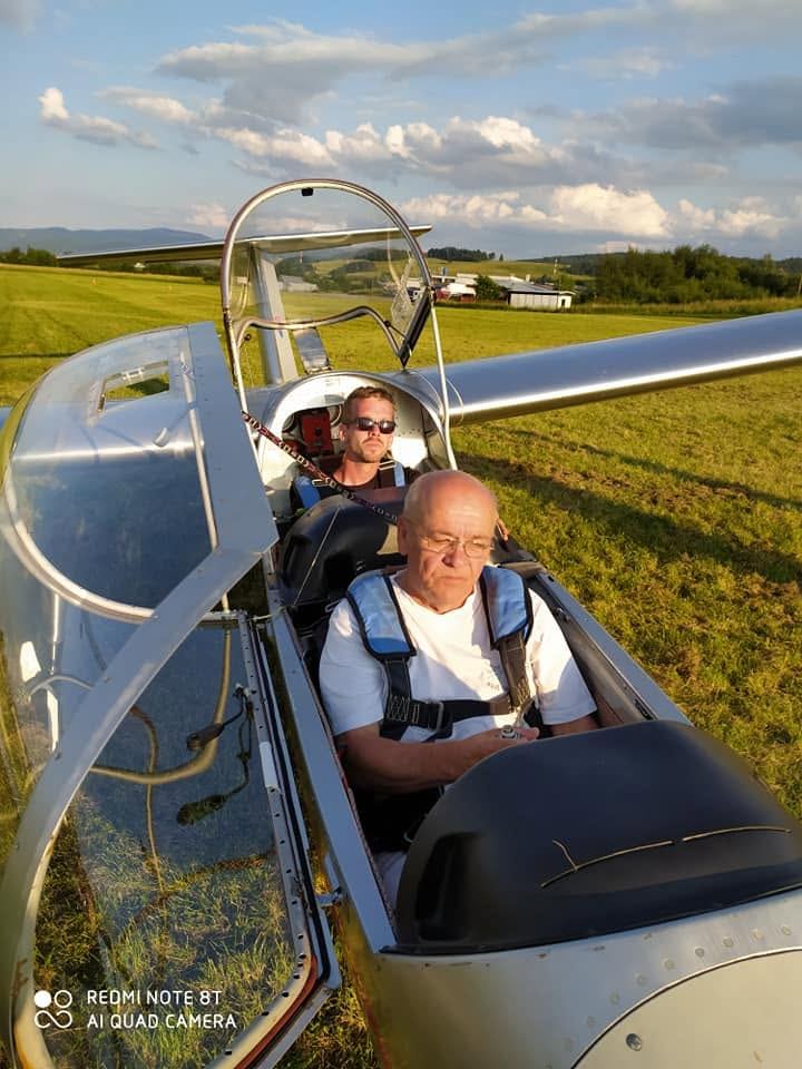 A two-person crew in a glider cockpit before launch