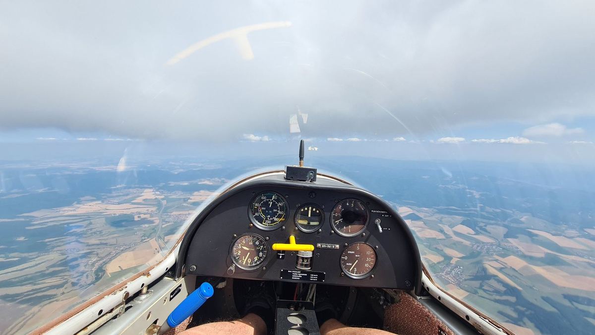 Instrument panel of the L-23 Super Blaník glider OM-0218 in flight beneath the clouds
